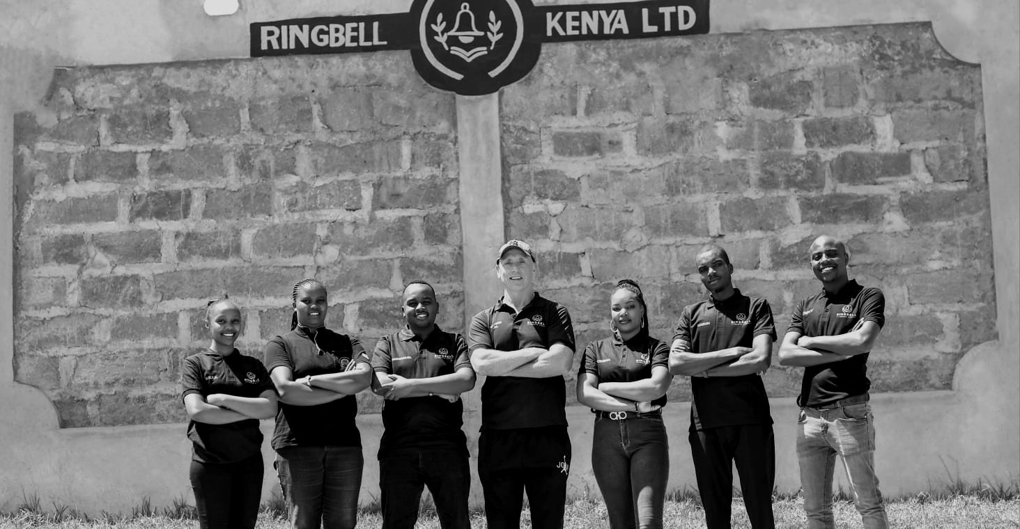 The Ringbell Kenya team in front of the Ringbell Kenya Ltd sign